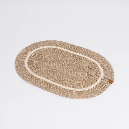 Handcrafted Small Oval Braided Cotton Rug – product and lifestyle view 2