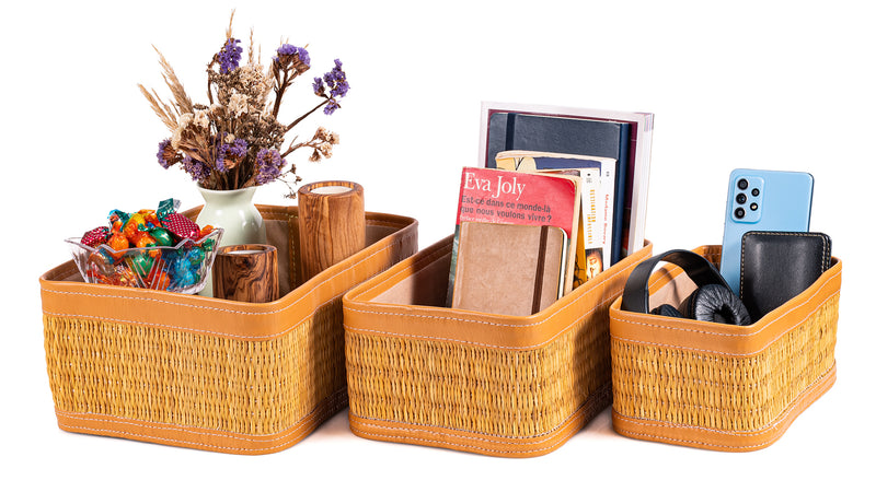 Set of 3 darido handmade natural fiber storage boxes with brown leather trim filled with office supplies and accessories. - Set of 3 Handmade Natural Fiber Storage Boxes with Colored Leather Trim