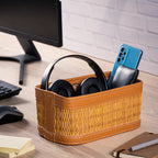 Brown darido natural fiber storage box with colored leather trim holding headphones and phone. - Set of 3 Handmade Natural Fiber Storage Boxes with Colored Leather Trim