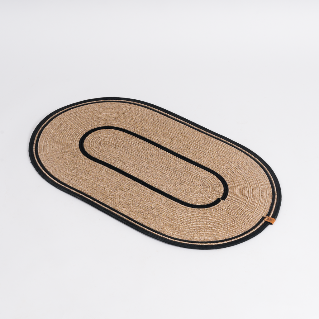 Handcrafted Large Oval Braided Cotton Rug – product and lifestyle view 7