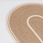 Handcrafted Large Oval Braided Cotton Rug – product and lifestyle view 10