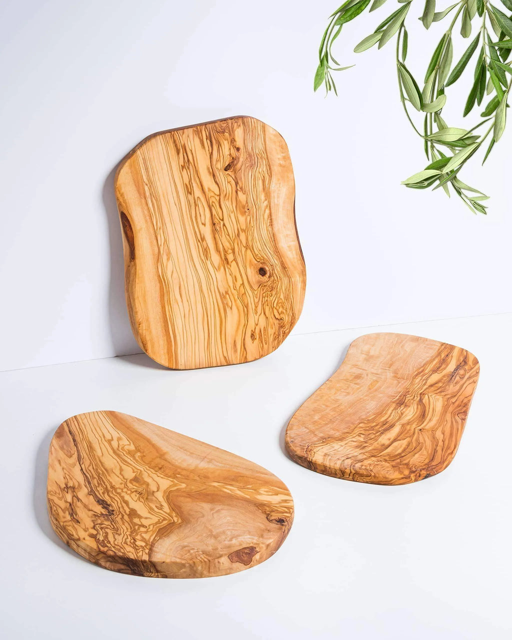 Set of three darido olive wood cutting boards with natural grain and rustic, organic shapes. - Handmade Olive Wood Cutting Board – Reversible, Rustic & Food-Safe | 12x7" (30x18cm)
