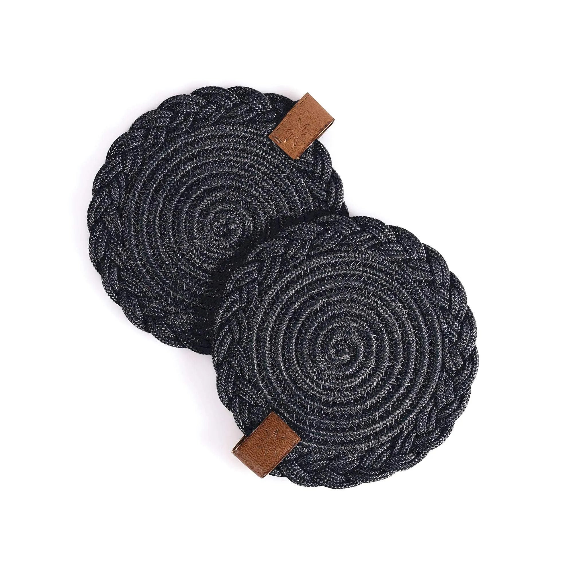 Set of 2 black Darido cotton coasters with braided edges and leather tags, 15cm diameter. - Set of 2 Black Coasters- 15cm