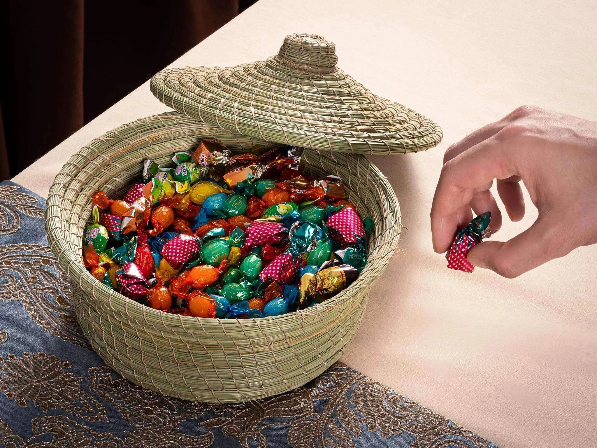 Traditional round halfa basket with lid, woven darido fibers, filled with colorful candies. - Traditional Halfa Basket