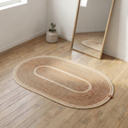 Handcrafted Large Oval Braided Cotton Rug – product and lifestyle view 6